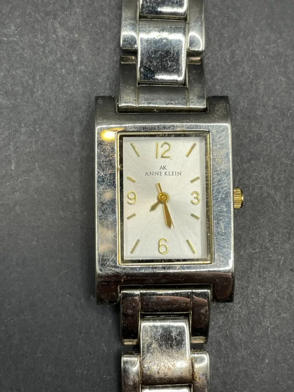 Anne Klein Women's 10/1409 Silver Dial Gold Accented Quartz Watch 21.5mm 6.5